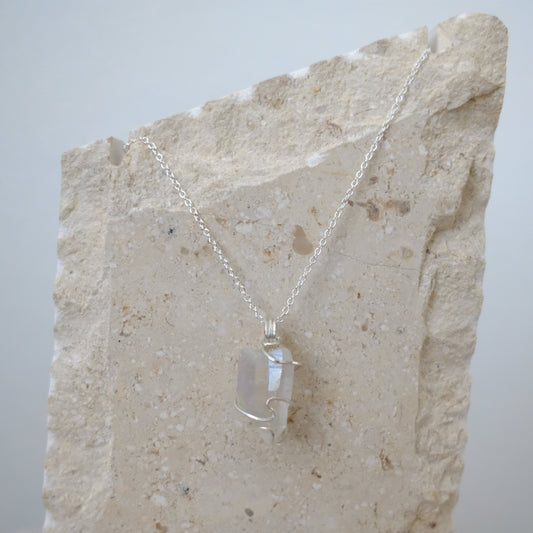 “Close-up of Handmade Sterling Silver Angel Aura Quartz Necklace showing iridescent rainbow crystal wrapped in hypoallergenic .925 sterling silver, artisan-crafted by J’s Divine Jewelry Designs.”