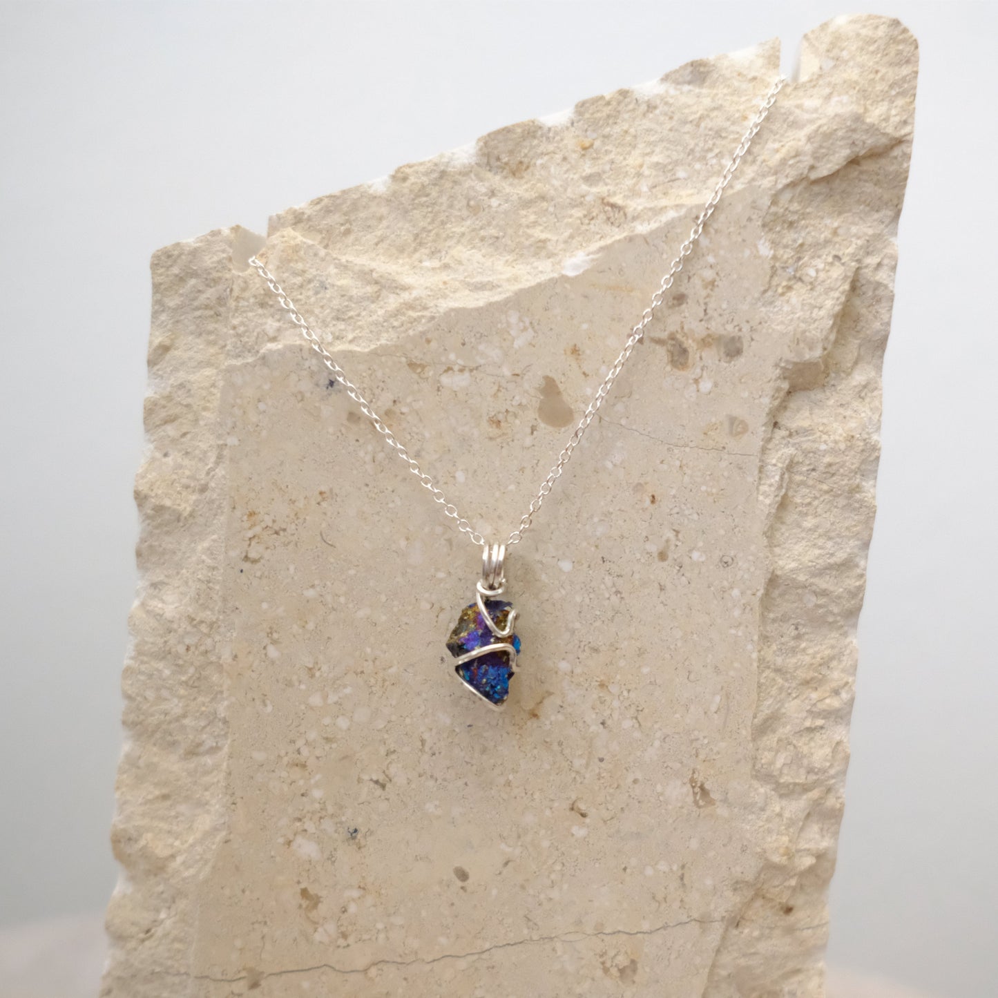 Handmade Chalcopyrite crystal necklace wrapped in sterling silver