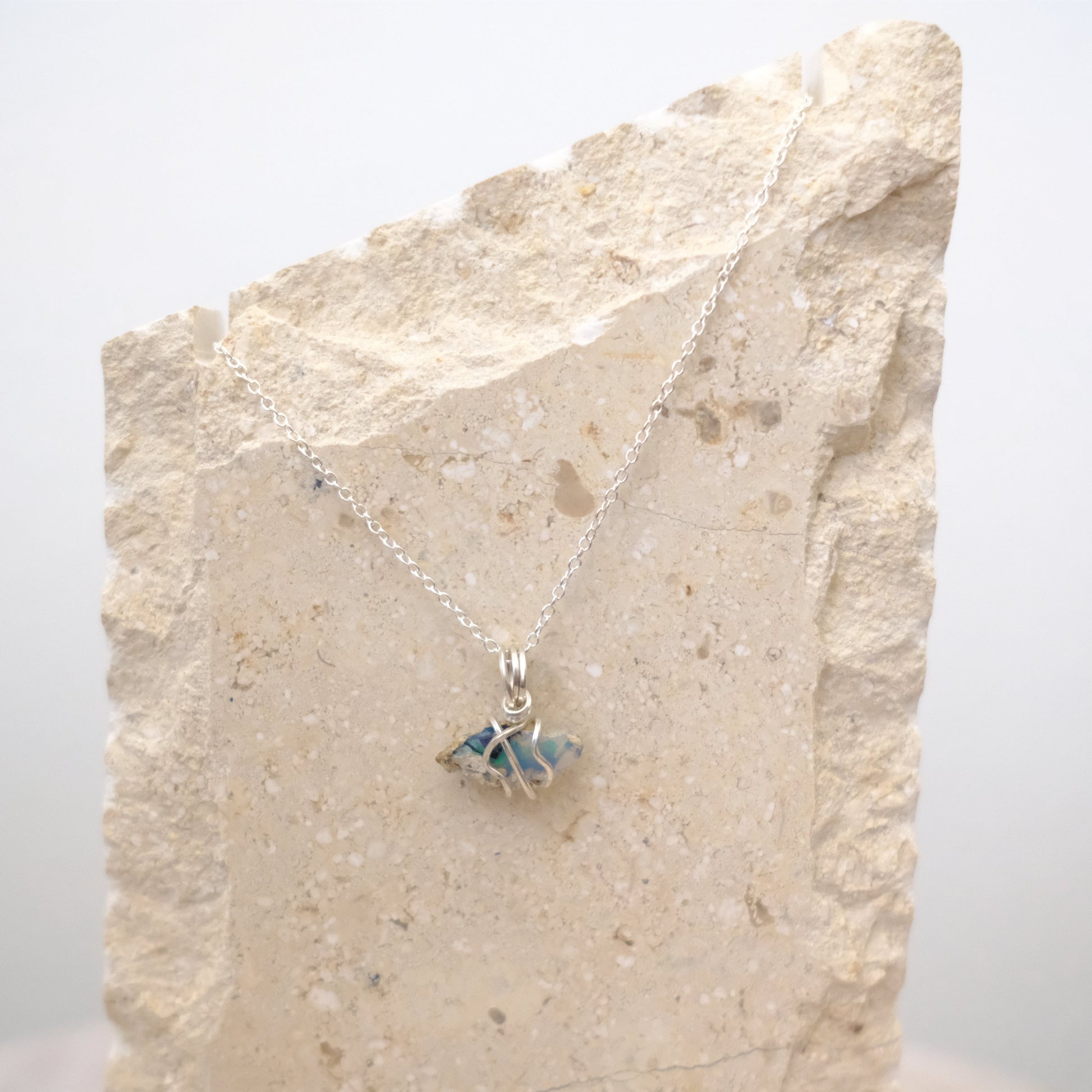 Handmade Ethiopian Opal necklace wrapped in sterling silver