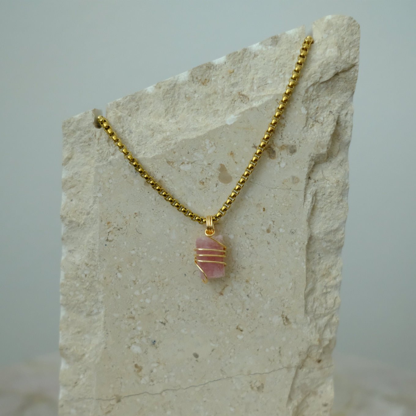 Handmade gold-plated pink tourmaline necklace with genuine crystal, luxury spiritual jewelry for love, compassion, and emotional healing.