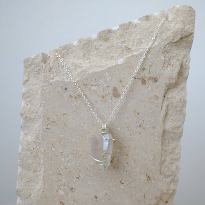 “Close-up of Handmade Sterling Silver Angel Aura Quartz Necklace showing iridescent rainbow crystal wrapped in hypoallergenic .925 sterling silver, artisan-crafted by J’s Divine Jewelry Designs.”