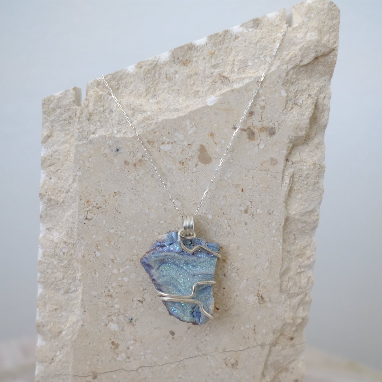 "Handcrafted chalcedony crystal pendant necklace in sterling silver – spiritual healing jewelry"