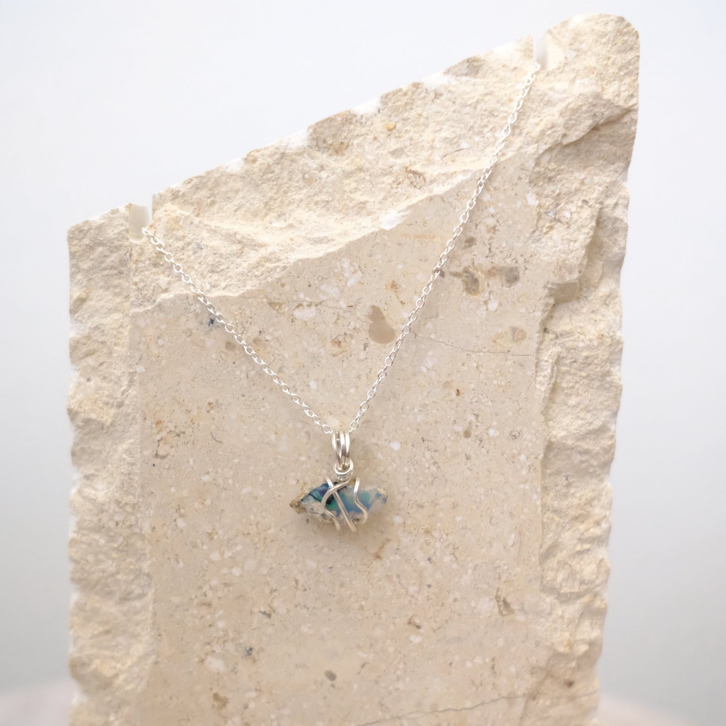 Handmade Ethiopian Opal necklace wrapped in sterling silver