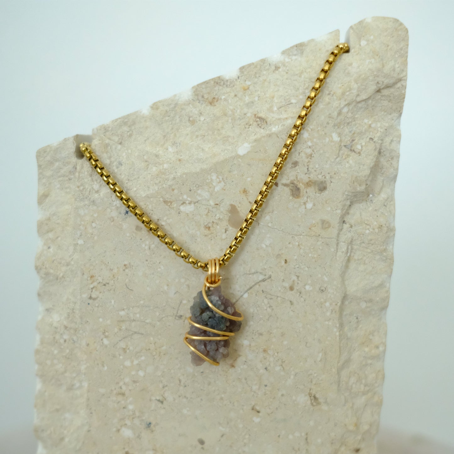 Handmade gold-plated grape agate necklace with natural purple cluster crystal, luxury spiritual jewelry for calm and intuition.