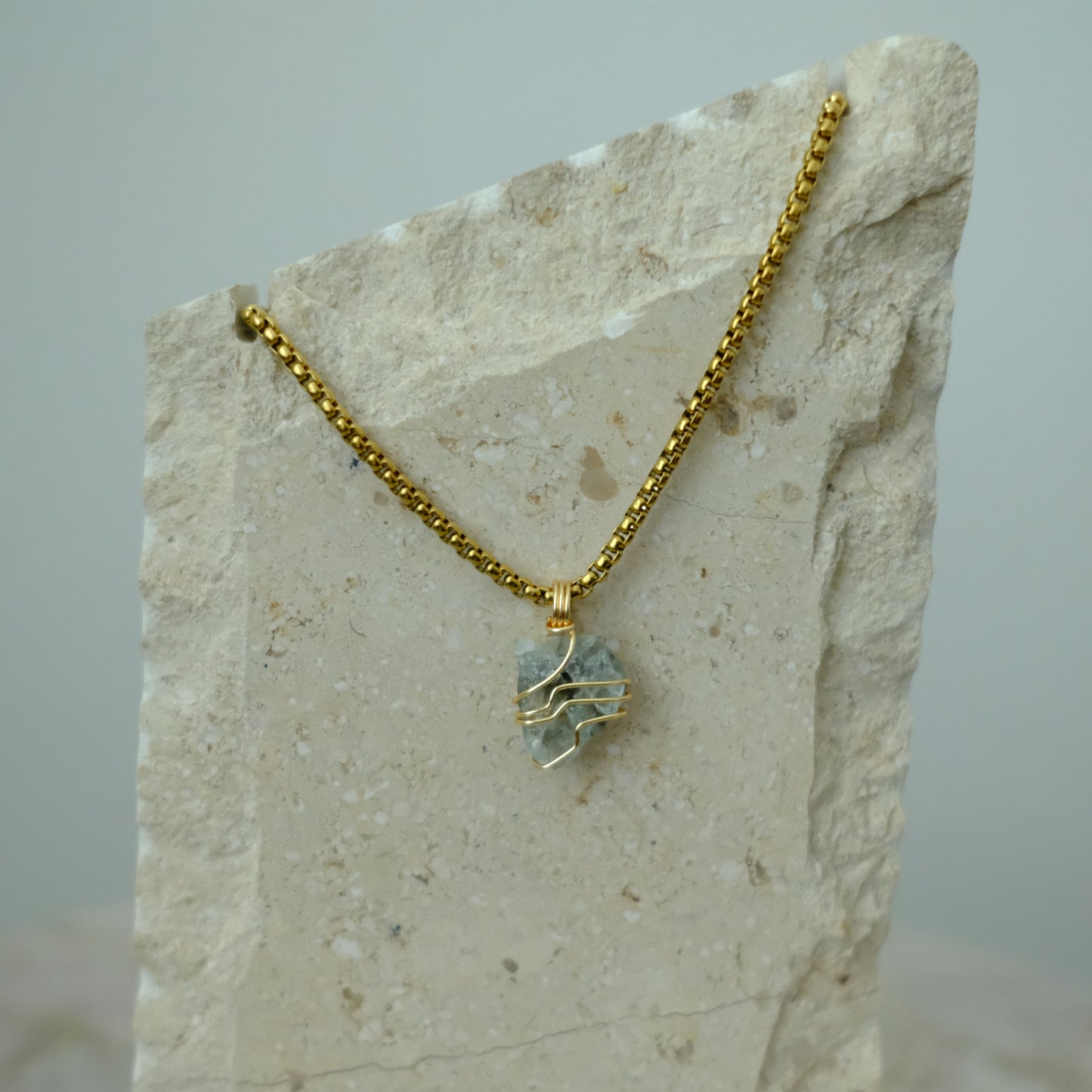 Handmade gold-plated aquamarine necklace with genuine blue crystal, luxury jewelry for calm, clarity, and emotional balance