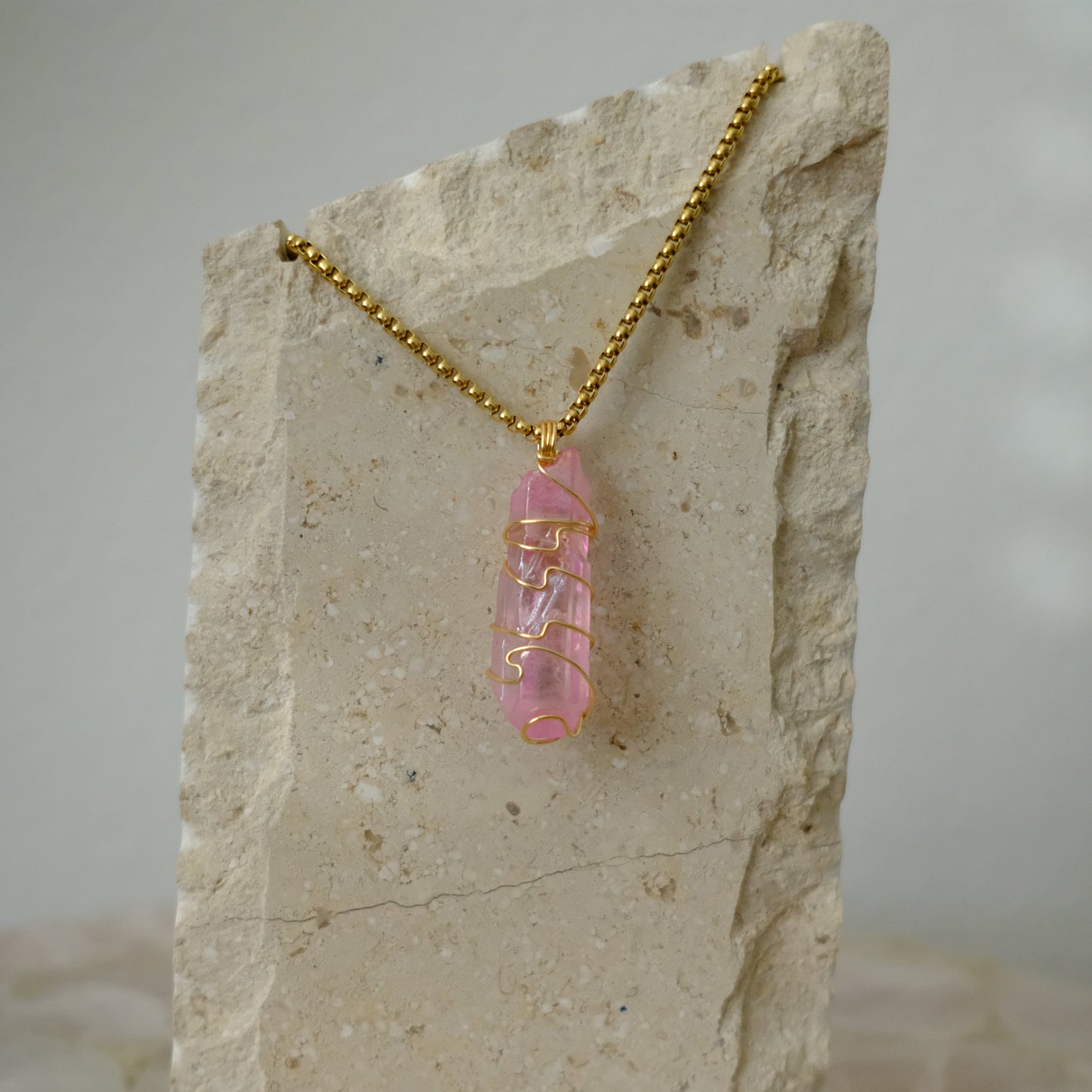 Handmade gold-plated rose aura quartz necklace with iridescent pink crystal, luxury jewelry for love and emotional healing.