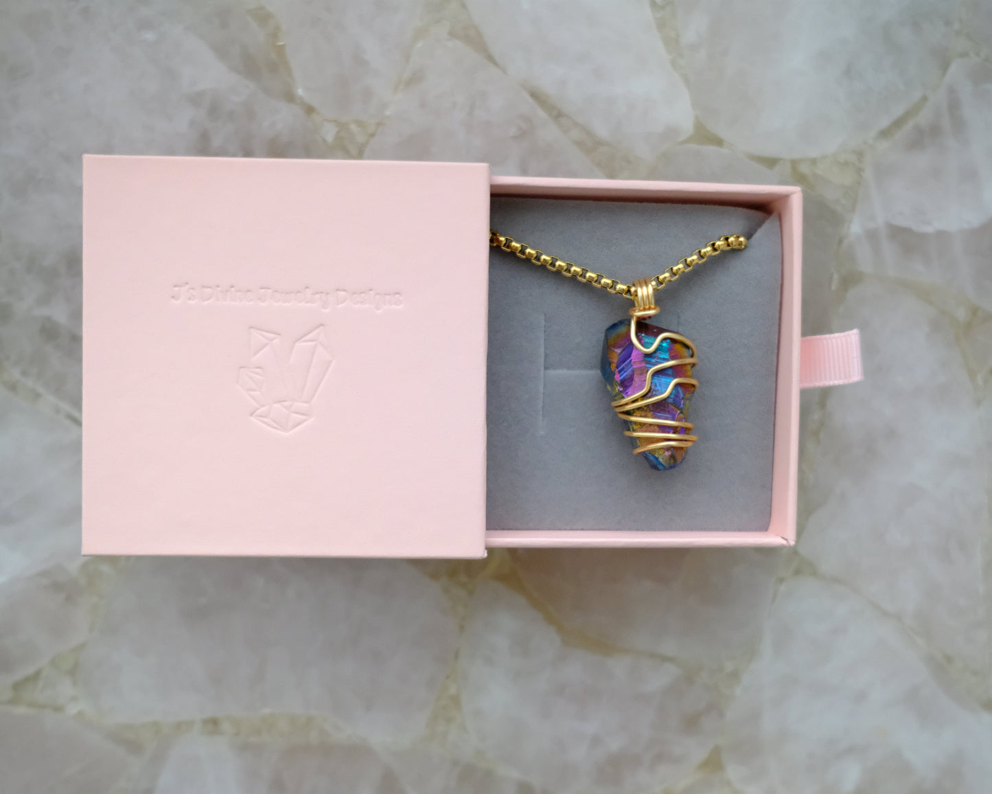 Gold-plated titanium aura quartz necklace displayed in J’s Divine Jewelry Designs luxury gift box, perfect for gifting.