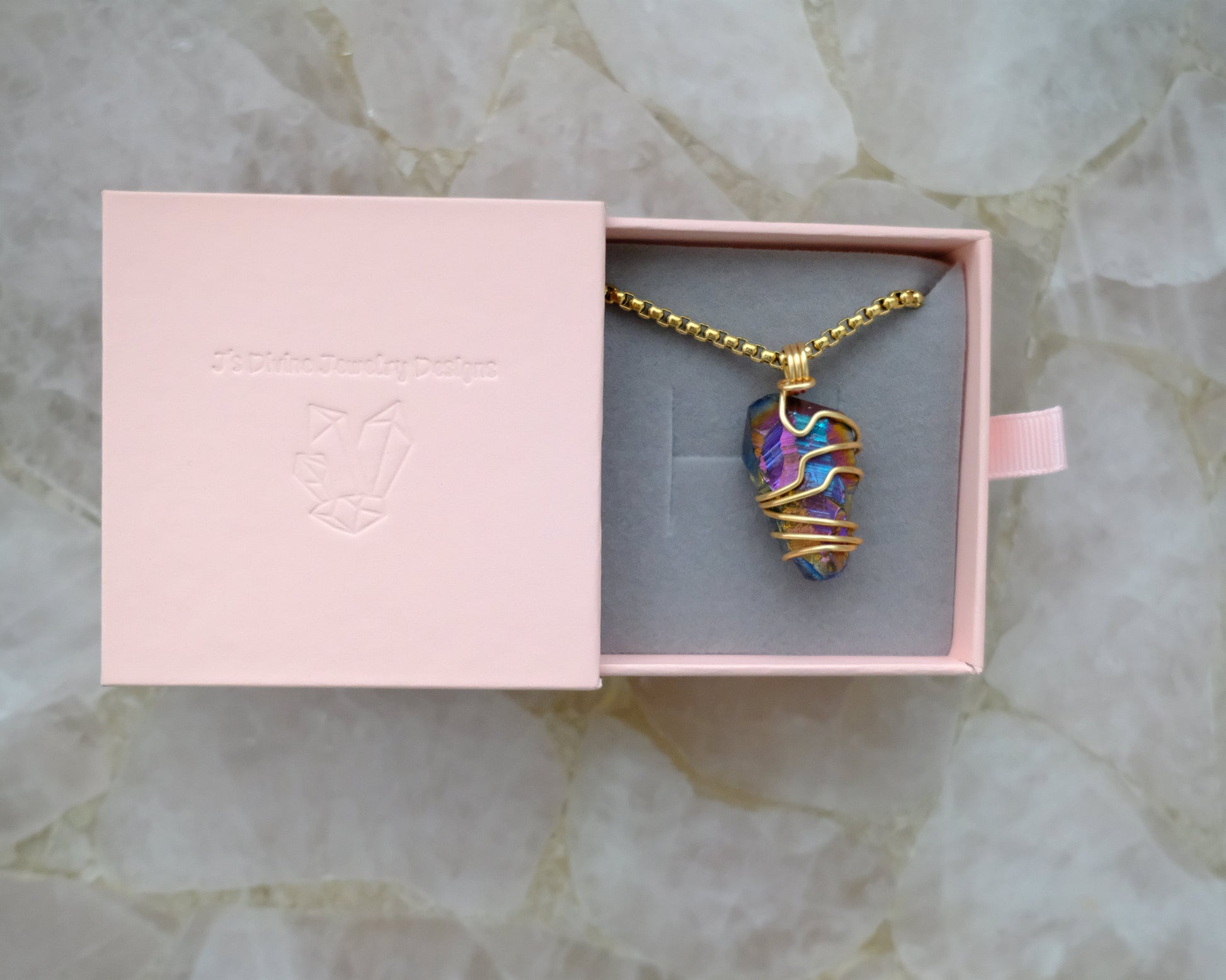 Gold-plated titanium aura quartz necklace displayed in J’s Divine Jewelry Designs luxury gift box, perfect for gifting.